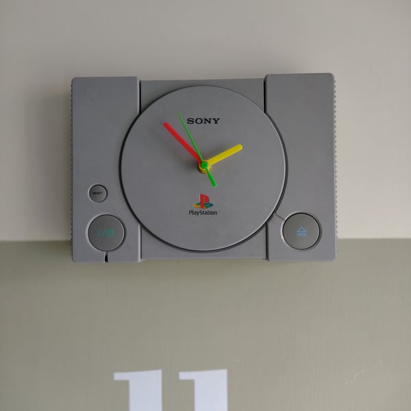 Unique Wall Clock upcycled from a Vintage Sony Playstation, Retro man cave decor