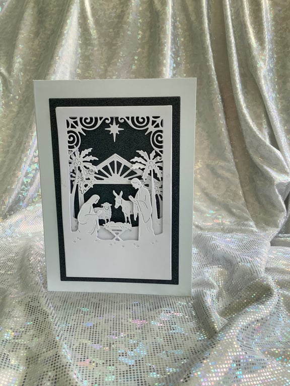 A Nativity Design unusual in its’s self. Beautiful 