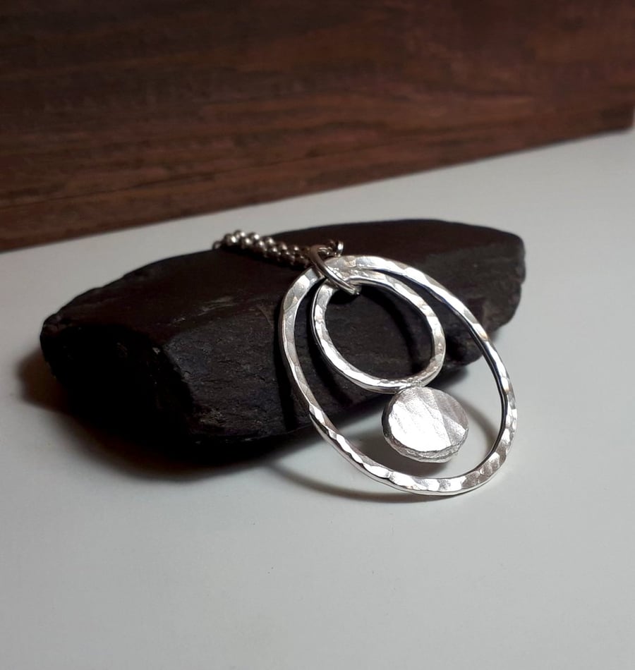 Sterling Silver oval pendant, Handmade Urban Designed Jewellery