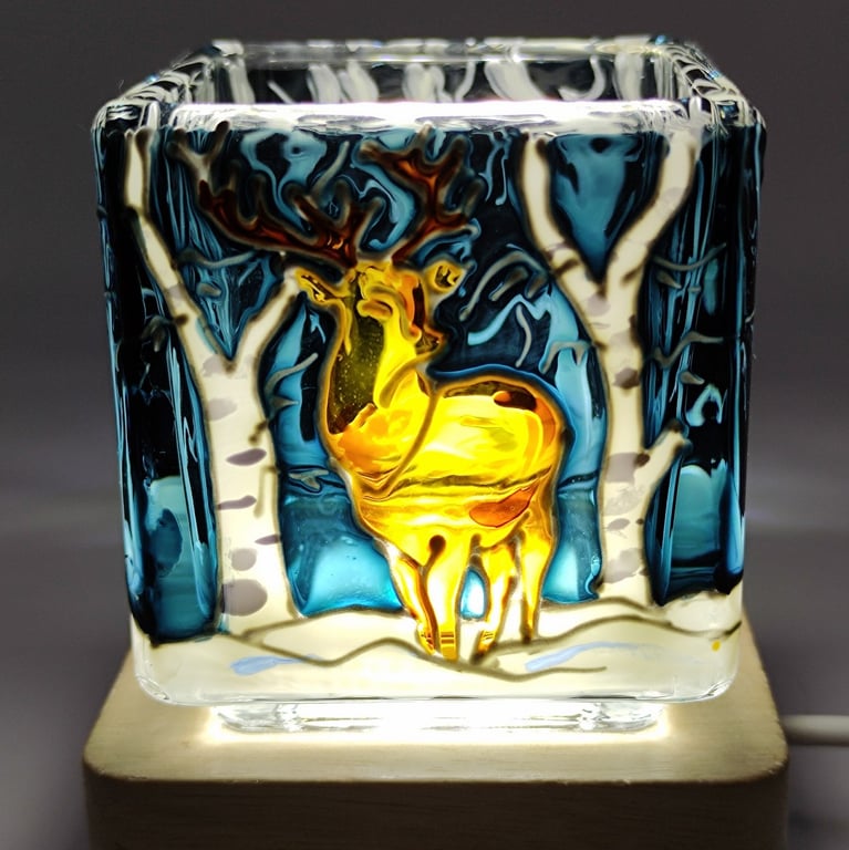 Hand painted glass candle holder, a red deer stag in the snowy birch woods