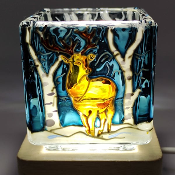 Hand painted glass candle holder, a red deer stag in the snowy birch woods