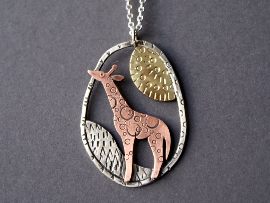 Sun worship pendant - giraffe