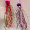 2 happy hand knitted jellyfish 
