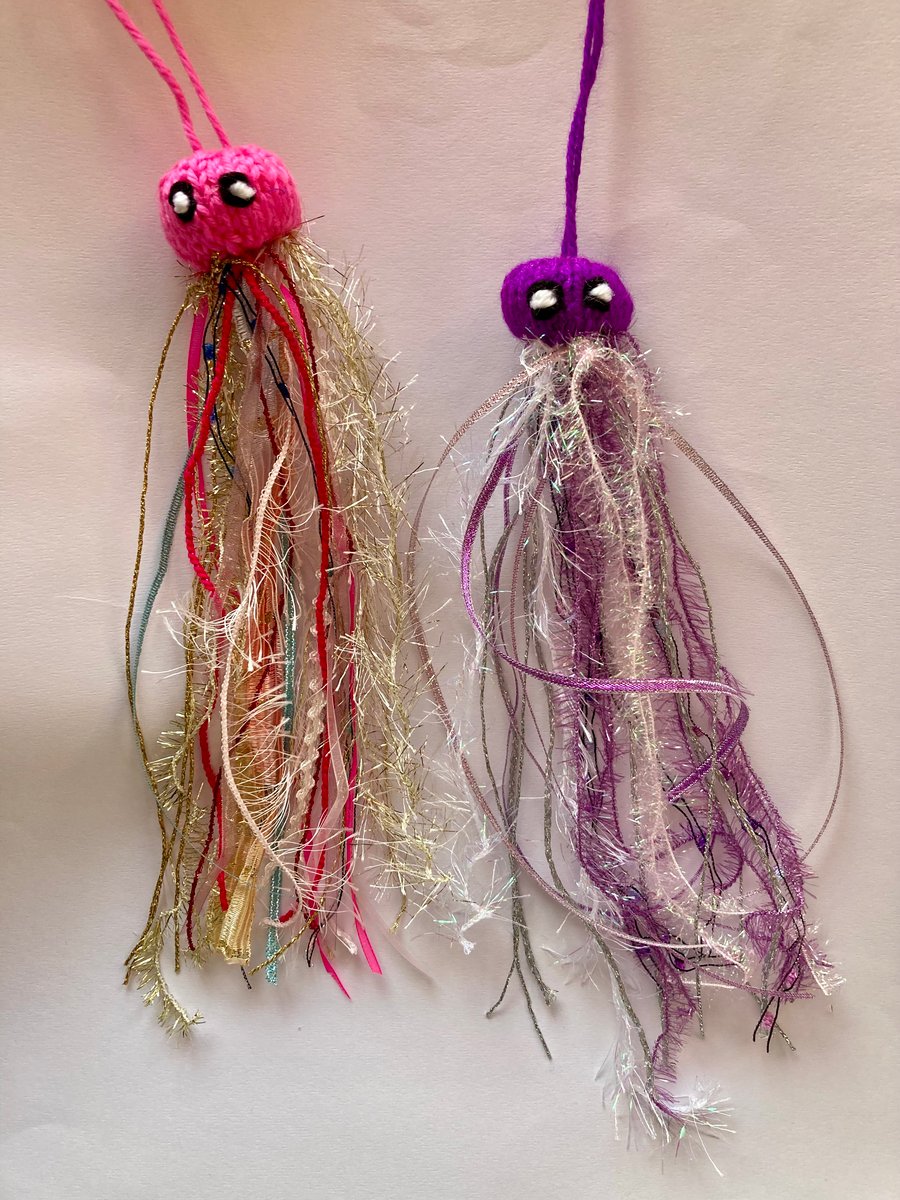 2 happy hand knitted jellyfish 