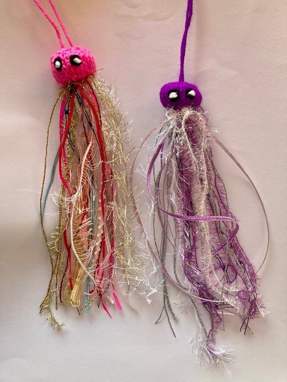 2 happy hand knitted jellyfish 