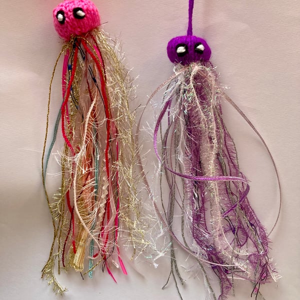 2 happy hand knitted jellyfish 