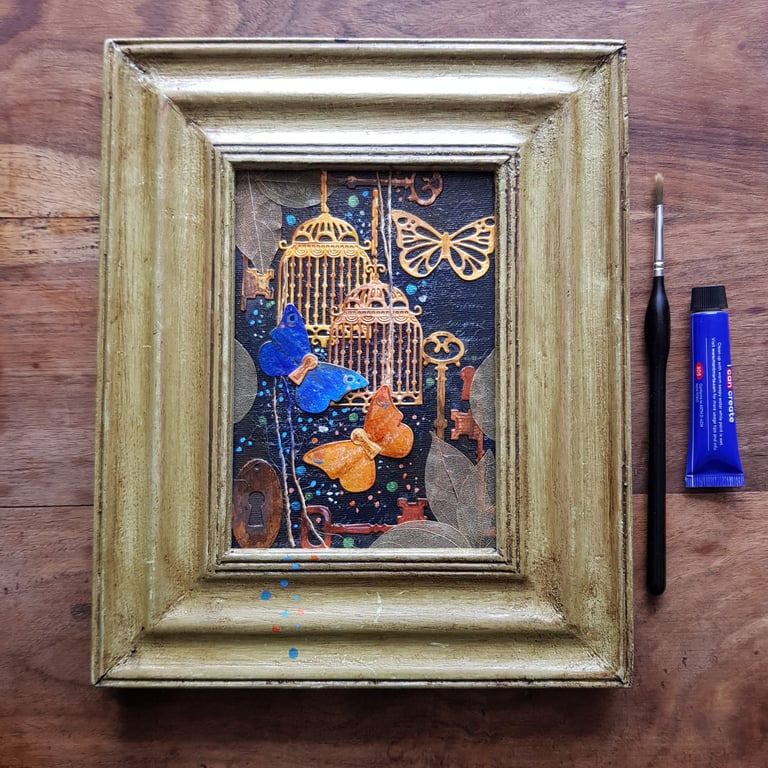 Blue, orange butterflies with bird cages, keys, leaves, original framed artwork