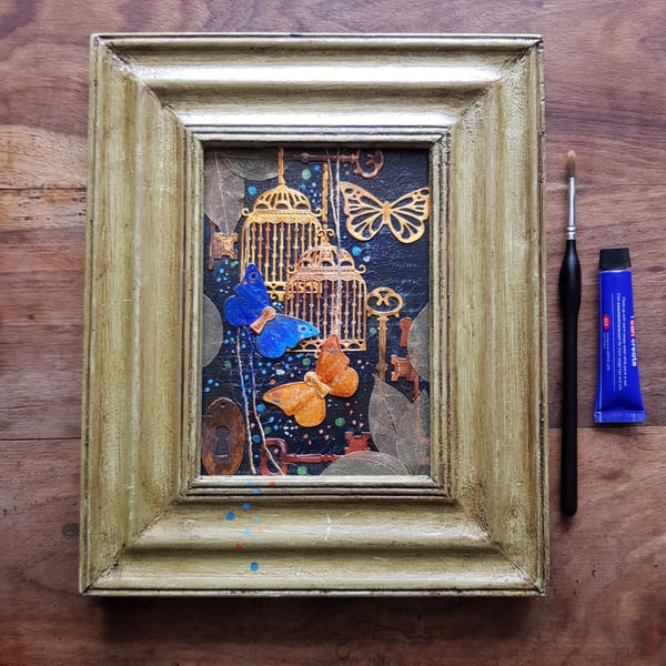 Blue, orange butterflies with bird cages, keys, leaves, original framed artwork