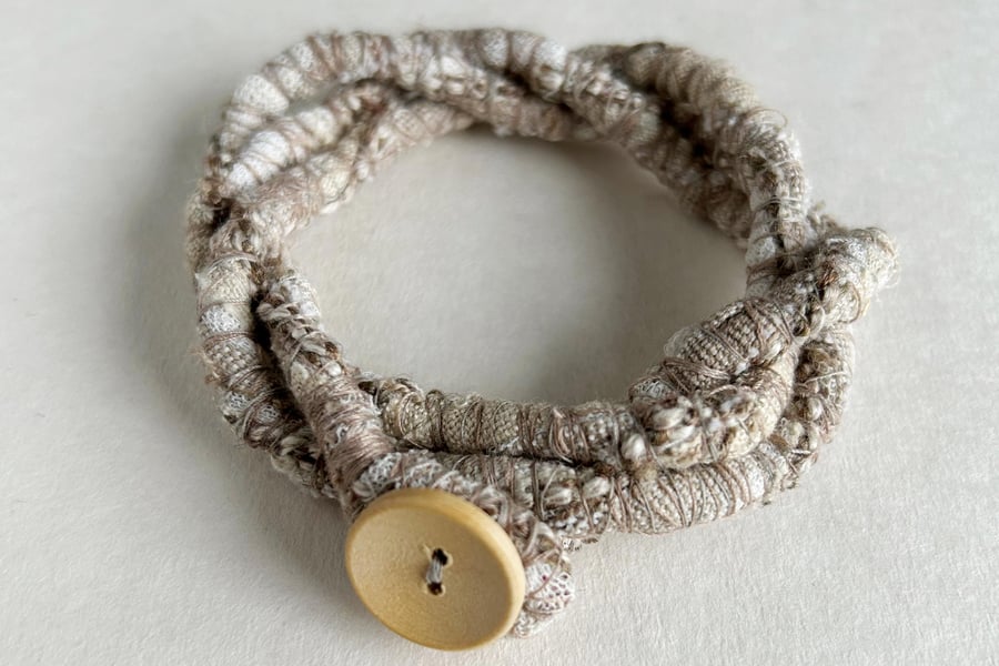 Sand and stone textile art bracelet