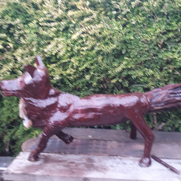 Wooden carved fox made out of solid wood
