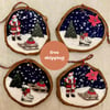 Christmas decorations. Set of four log slice Christmas decoration.