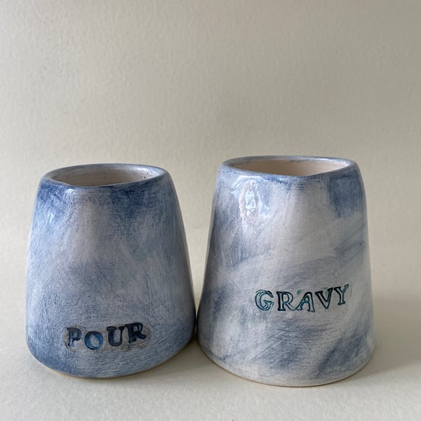 Pour gravy jug set.