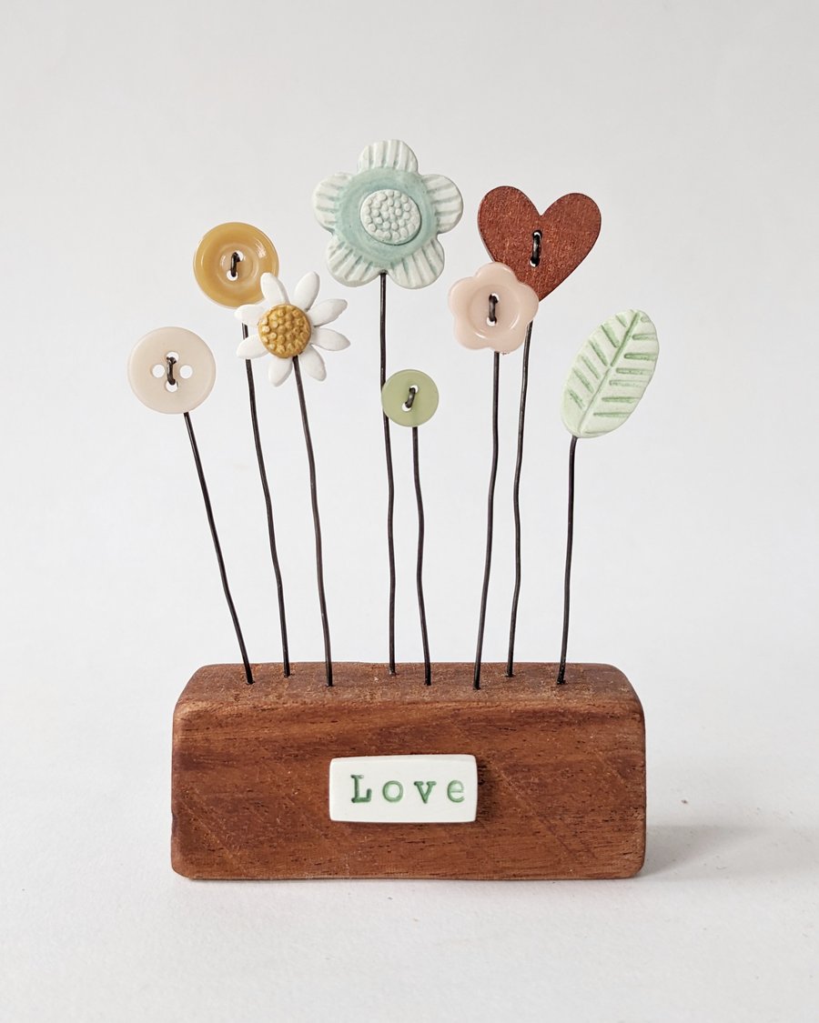 Clay and Button Flower Garden in a Wood Block 'Love'