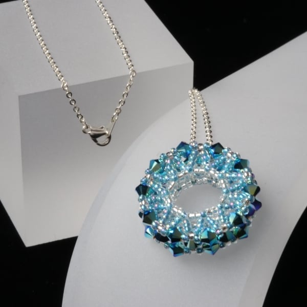 Sparkly Aqua Blue Beaded Wheel Pendant