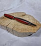 Hand Turned Epoxy Twist Pen - Red and Purple with Gun Metal Plating - Image 1