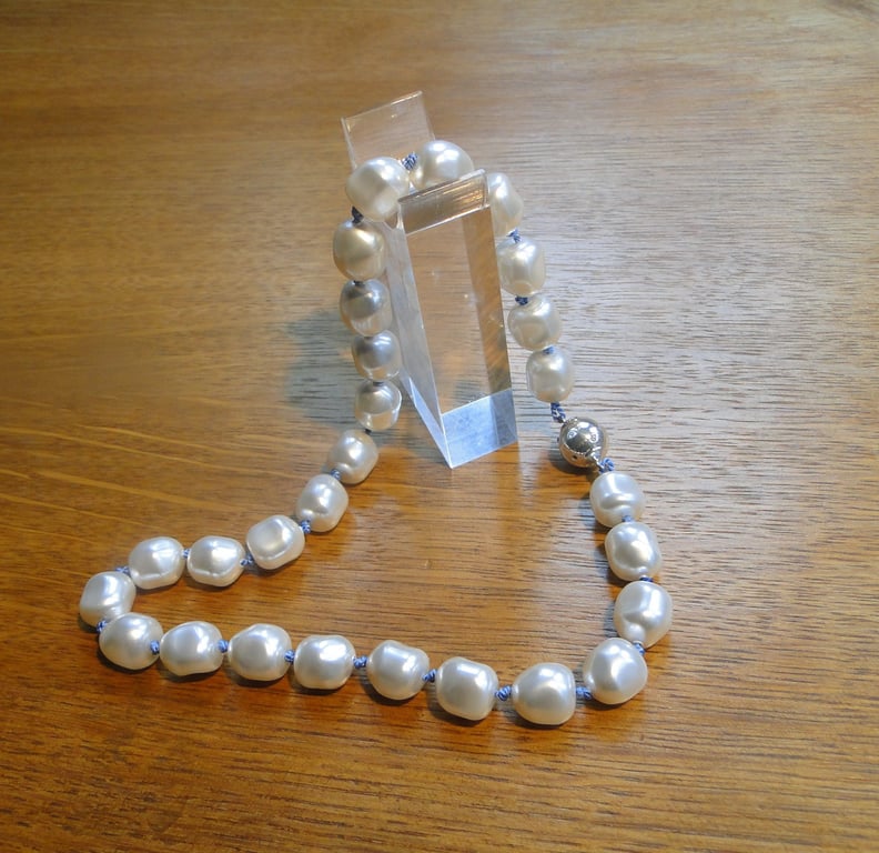 Cream glass pearl necklace  Traditionally knotted with pink silk thread Present