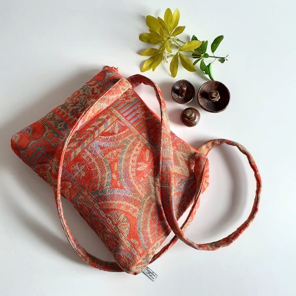 Handbag or shoulder bag in an Autumnal tapestry fabric with chunky zip.
