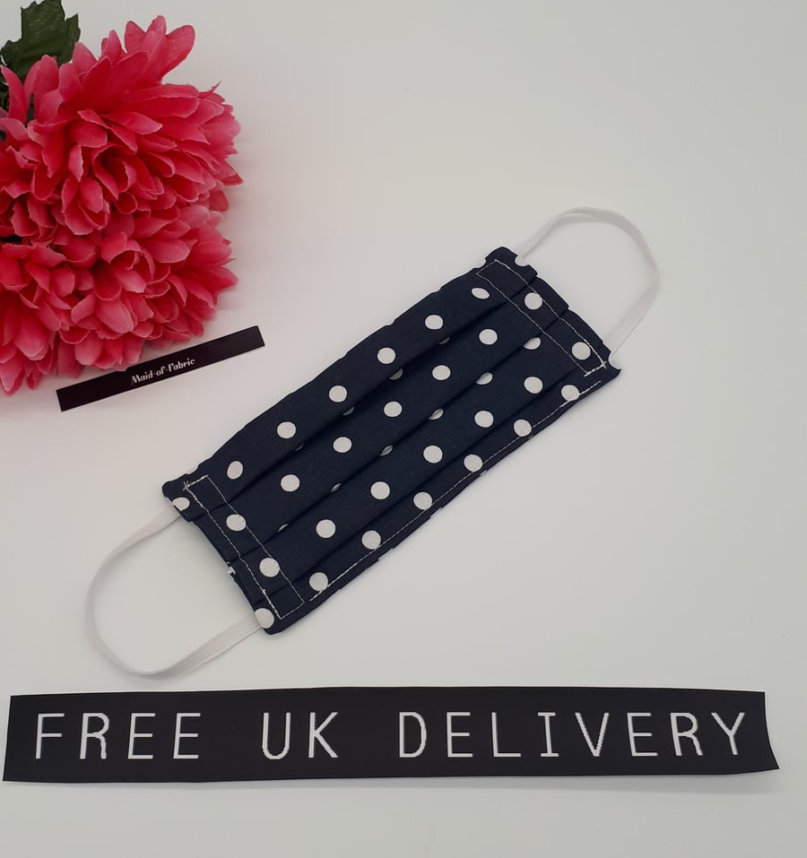 Face mask,  small, 3 layer,  machine washable in navy blue polkadot fabric 