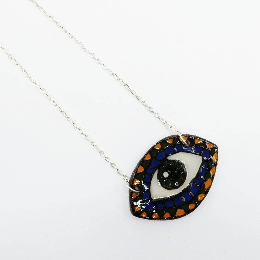 Eye pendant necklace with a south American influenced pattern