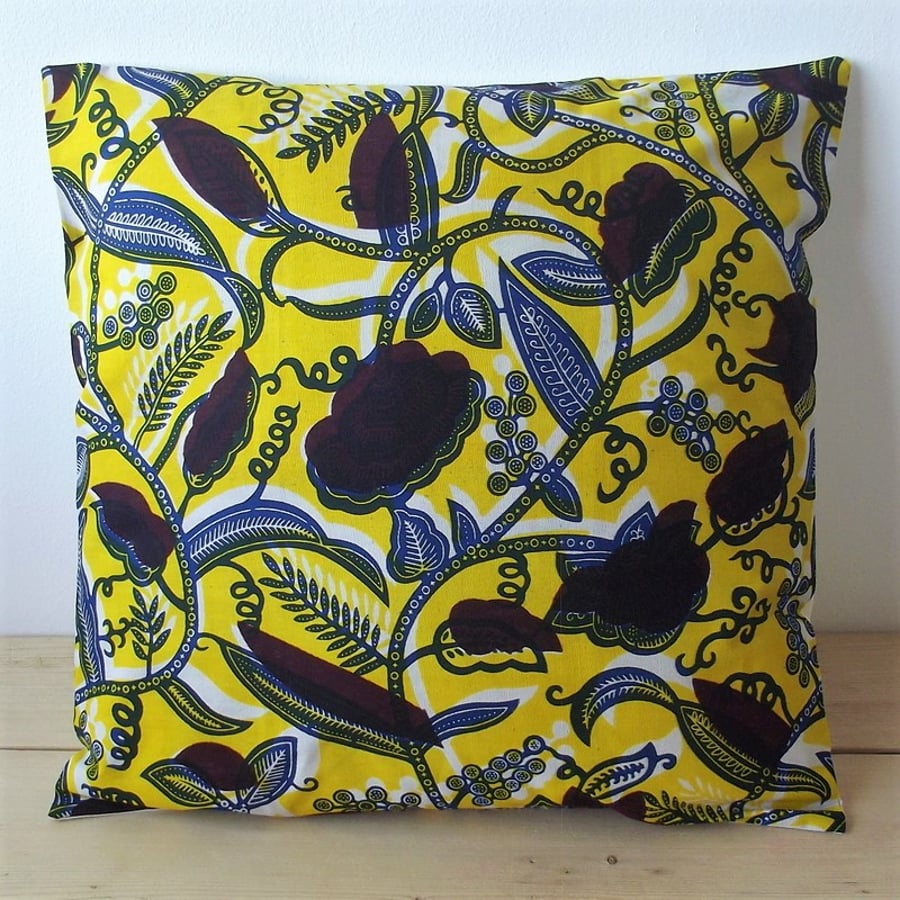 Cushion cover. African wax print, indigo and burgundy on yellow and white