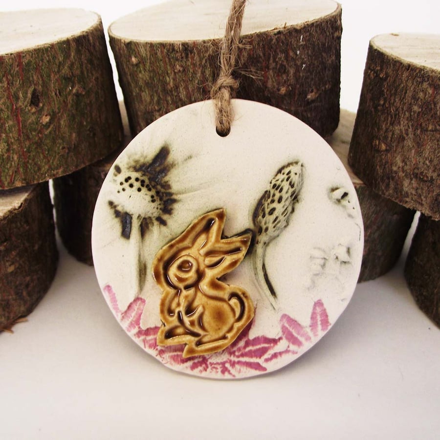 Sale Pottery decoration with natural flower and rabbit motif.