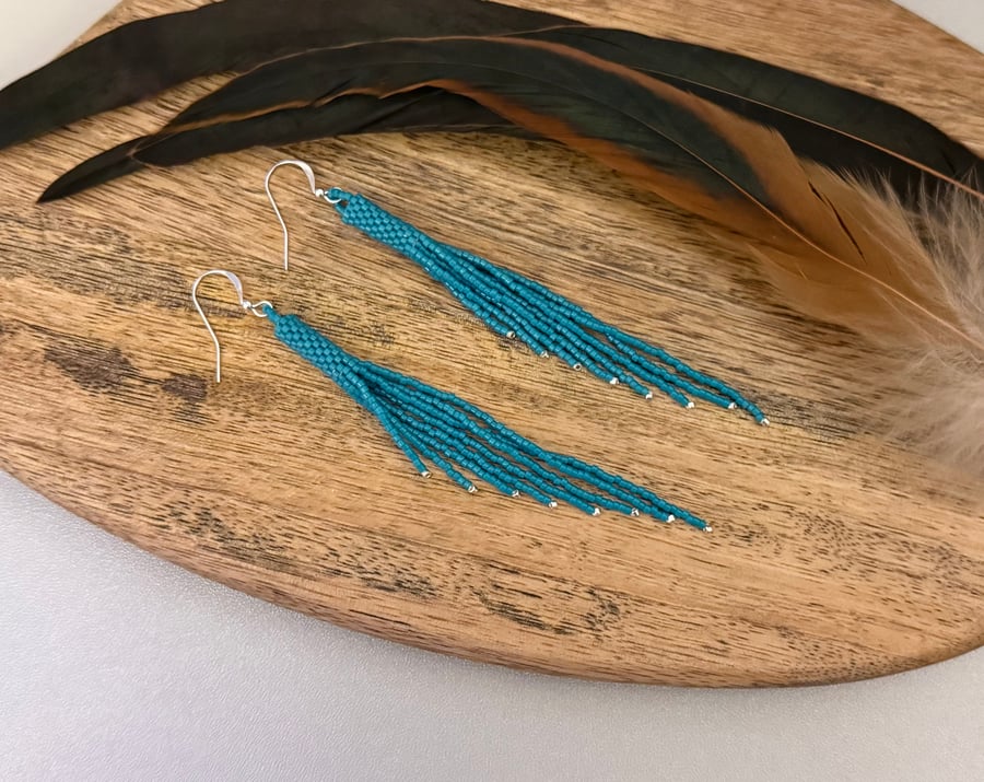 Deep sky blue bead woven tube fringe earrings