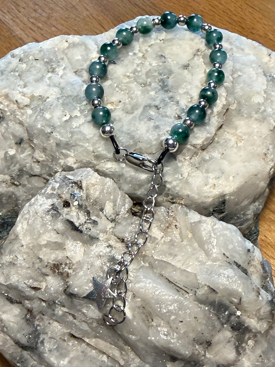 Beaded gemstone bracelet with star charm
