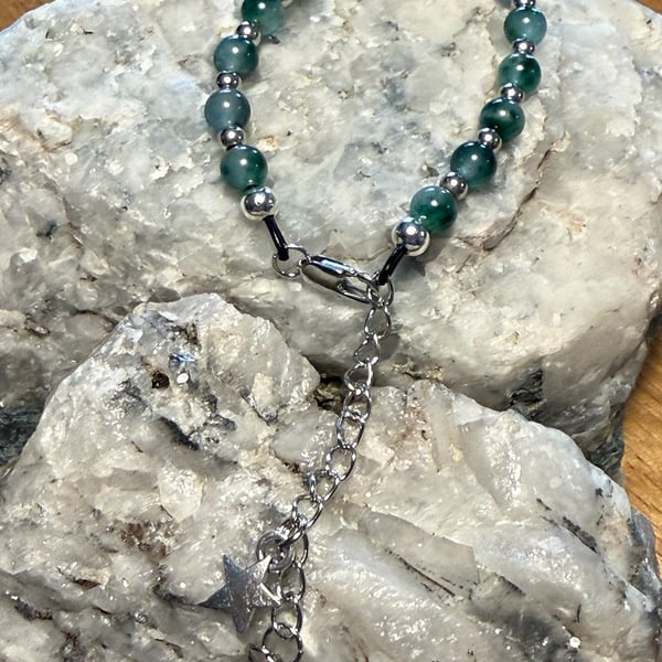 Beaded gemstone bracelet with star charm
