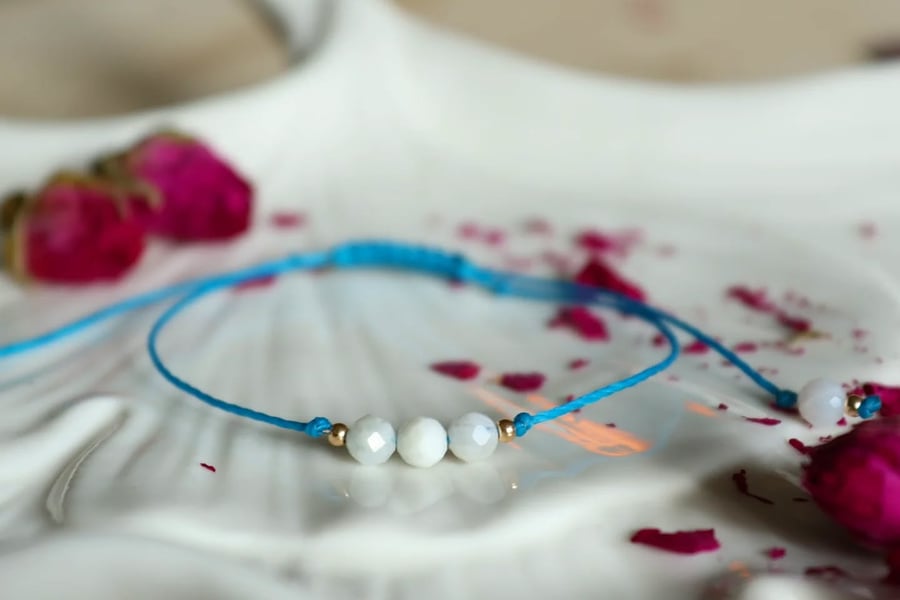 Delicate bracelet with Moonstone in turqoise colour cord