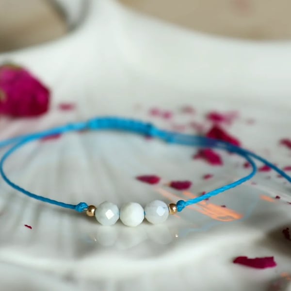 Delicate bracelet with Moonstone in turqoise colour cord