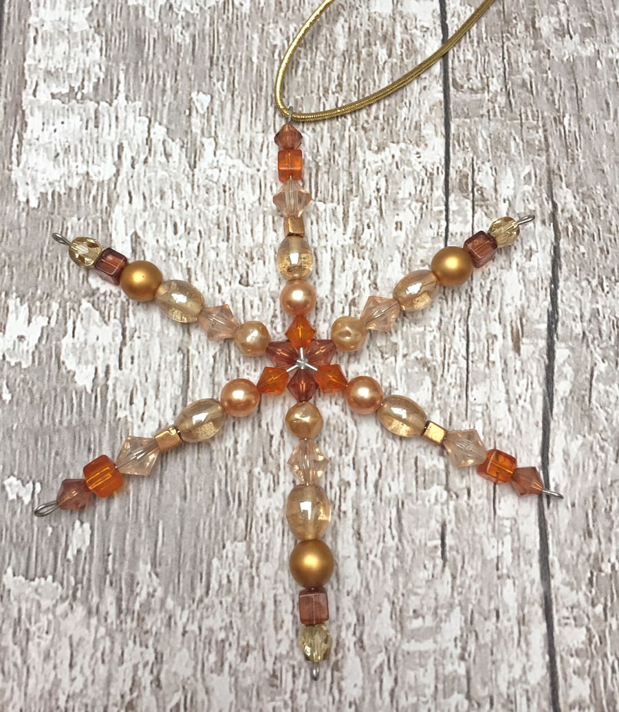 Snowflake ornament with assorted glass and acrylic beads in Topaz, yellow, gold