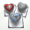 freehand embroidered skeleton heart textile brooch blue