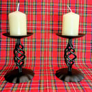 A pair of tall blacksmith-made candlesticks in Baronial style. 