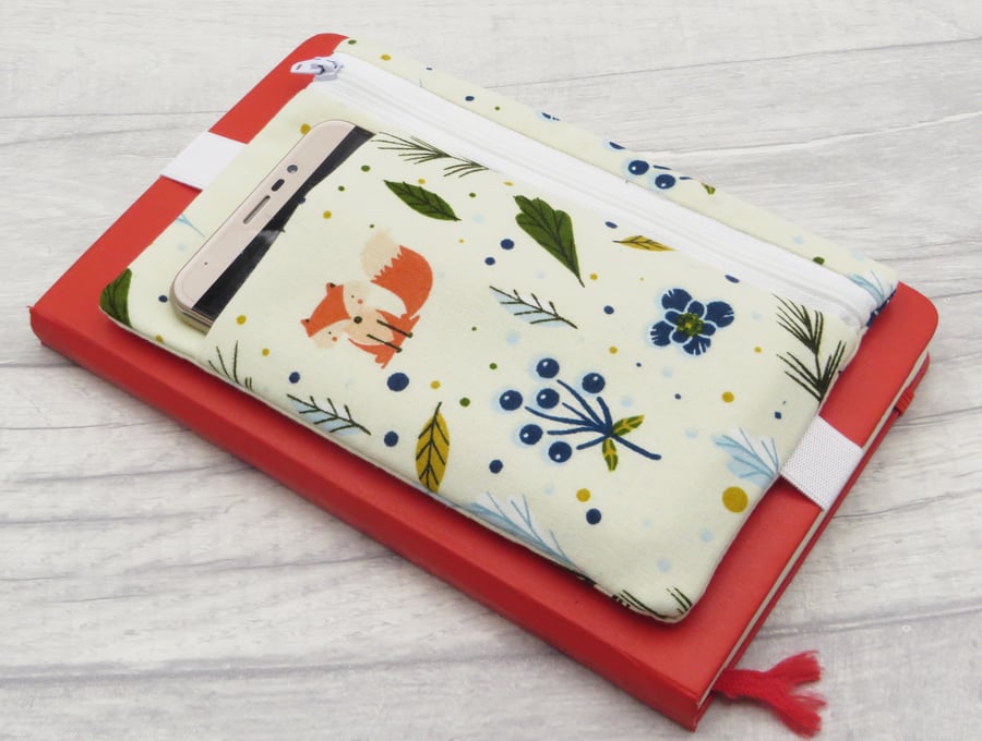 Journal Pencil case with pocket and band.