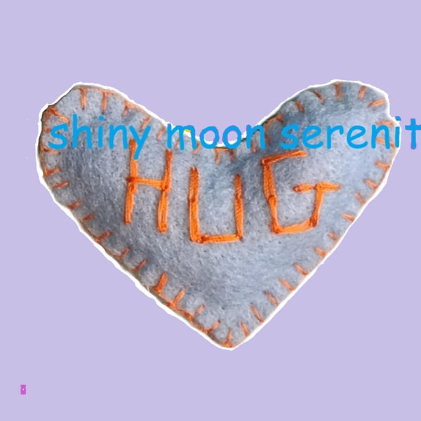 Pocket Hug Small, Light Blue with Orange stitching