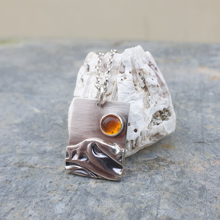Silver mountains, landscape pendant with amber sun 