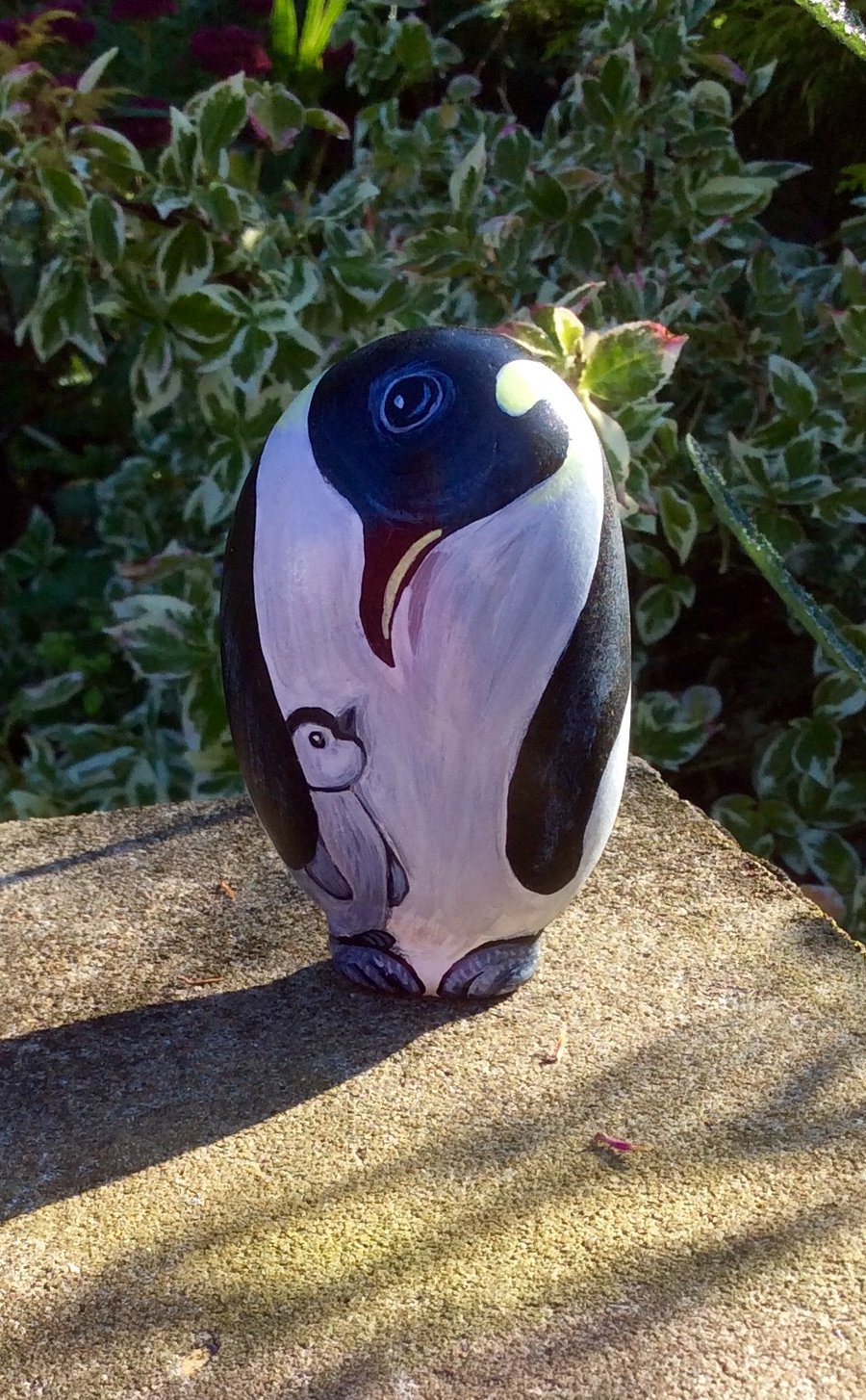 Penguin hand painted rock