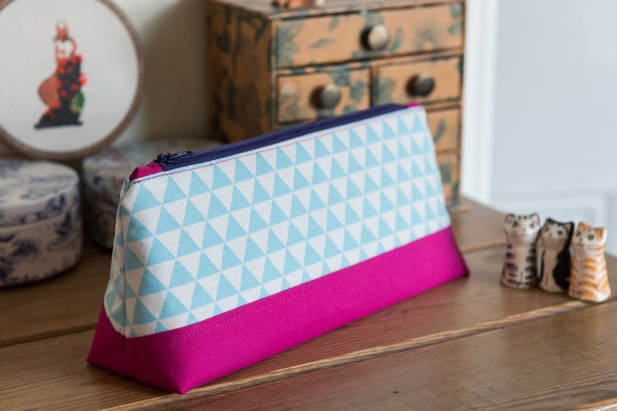 Zip pouch in blue flags print in a really useful size, perfect as a make up bag 