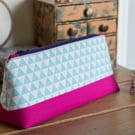 Zip pouch in blue flags print in a really useful size, perfect as a make up bag 