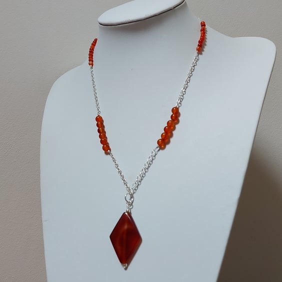 Sterling Silver Chain necklace with Carnelian Pendant.