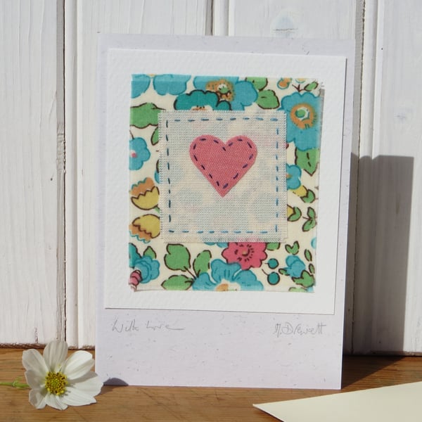 Hand-stitched heart card with cheerful Liberty tana lawn cotton background