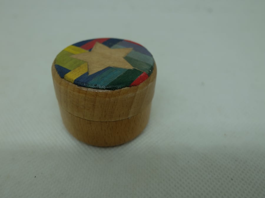 Small round wooden pot with colourful veneered lid