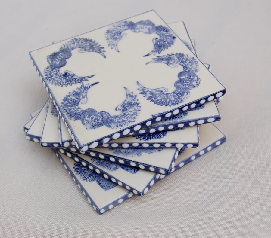 set if 6 blue winged love heart coasters