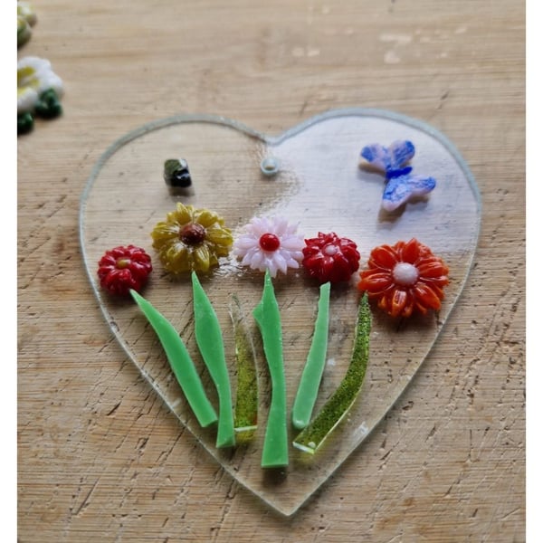 Fused glass heart that's a Suncatcher and can be used in many ways