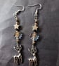 Wintry beaded star and leaf dangle earrings with silver stag charm  - Image 1