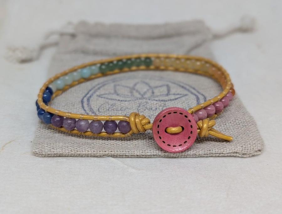 Pastel rainbow gemstone large bracelet with gold leather and pink button