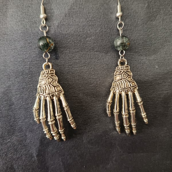 Gothic skeleton hand dangle earrings with bead detail 