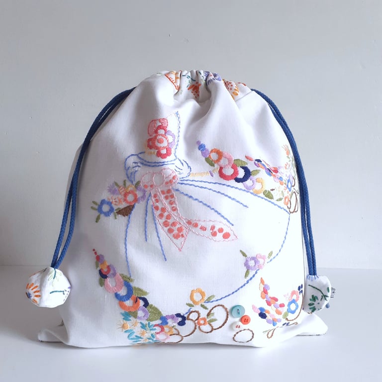 Drawstring bag recycled vintage embroidery with a girl in a romantic crinoline