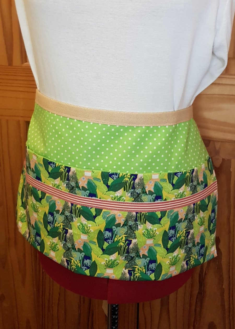 Garden apron, with snips, twine, labels and pencil: jungle plants