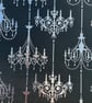 Four sheets of black card with silver and gold printed chandeliers